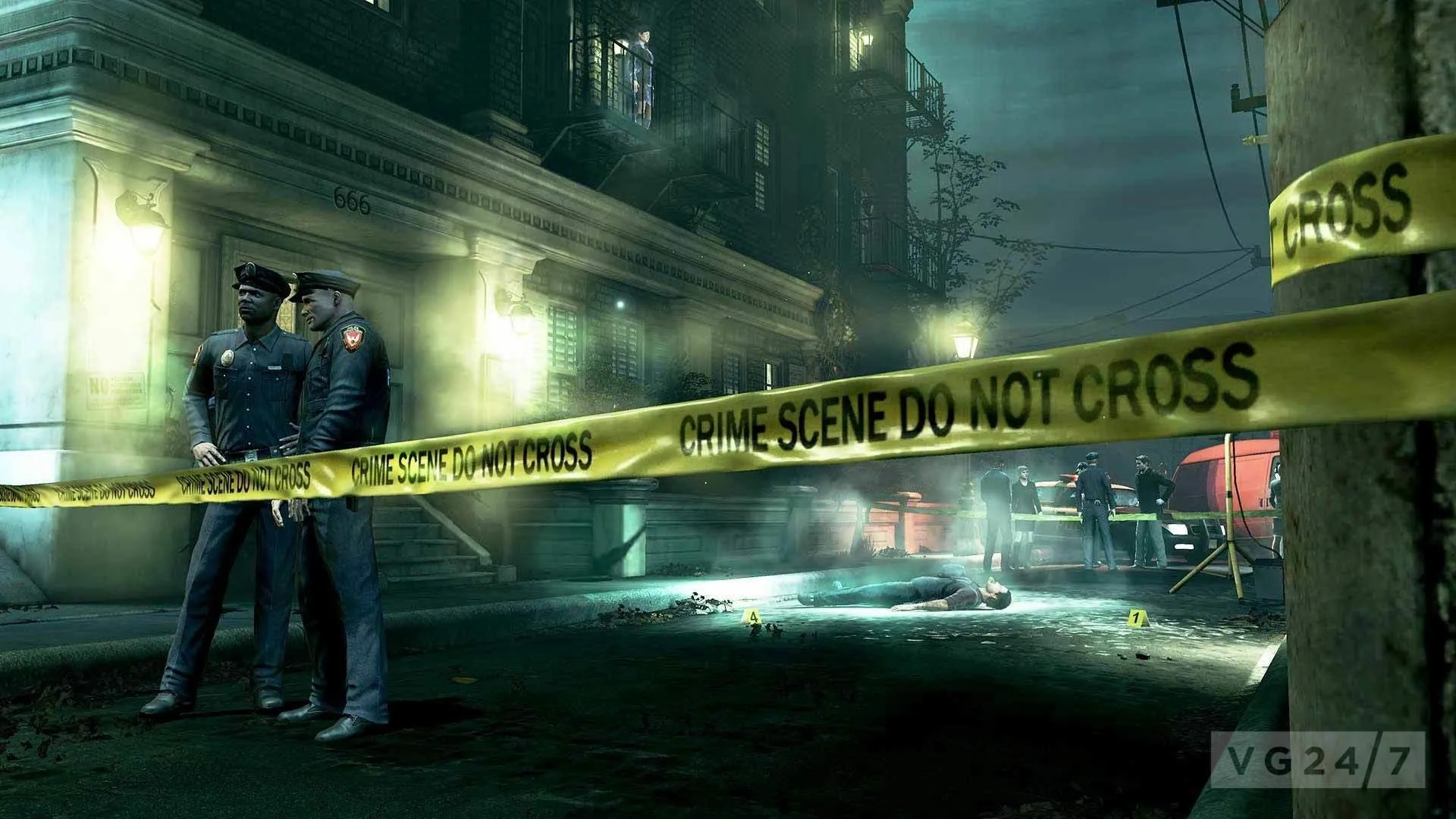 A man standing next to a police tape.
